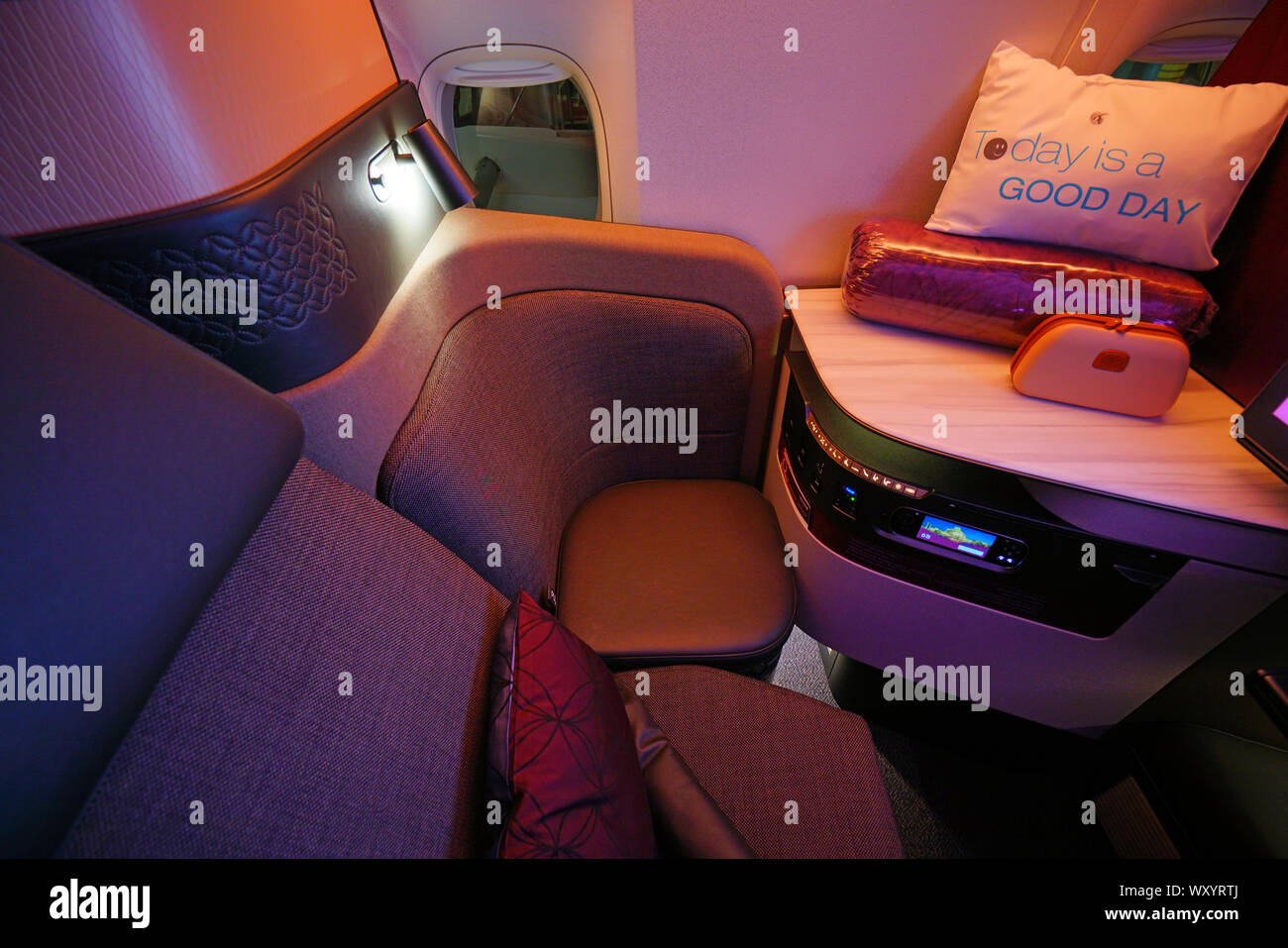 DOHA, QATAR -17 JUN 2019- View of the QSuites Business Class seats in an Airbus A350 from Qatar Airways (QR). Stock Photo