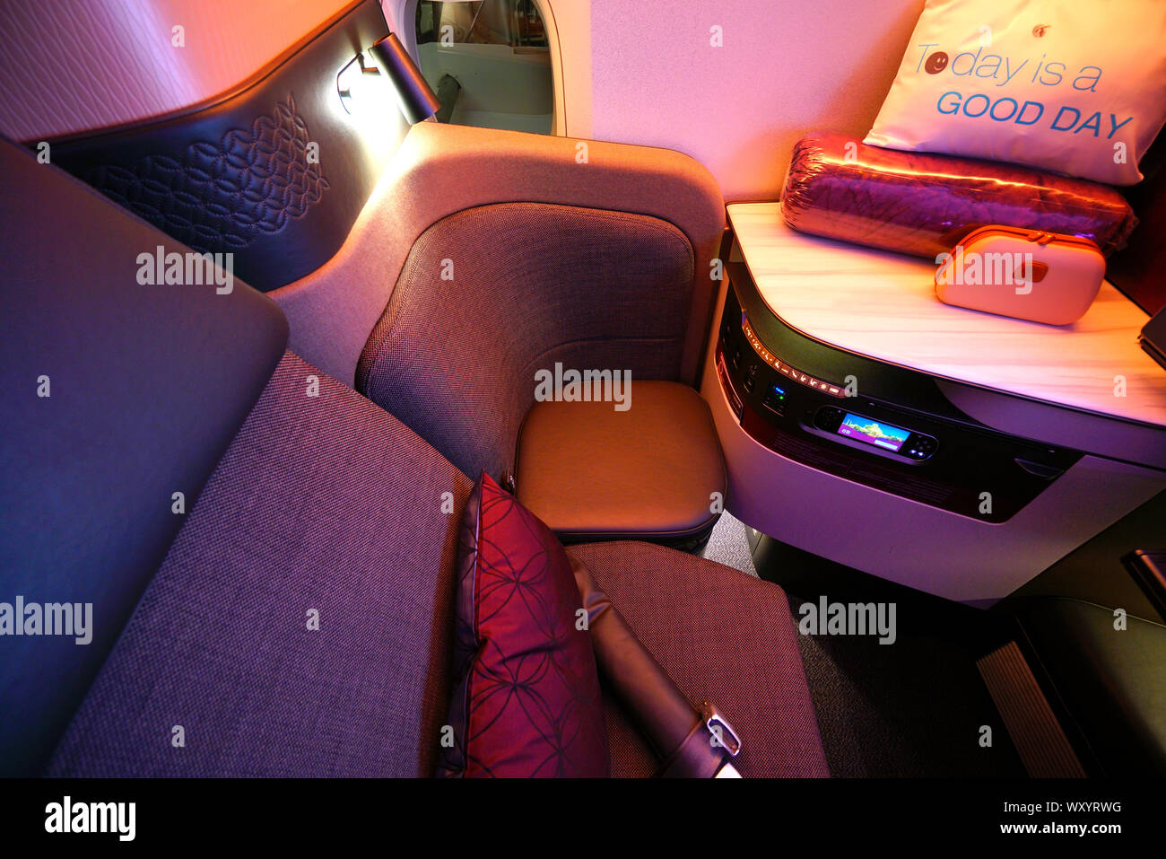 DOHA, QATAR -17 JUN 2019- View of the QSuites Business Class seats in an Airbus A350 from Qatar Airways (QR). Stock Photo