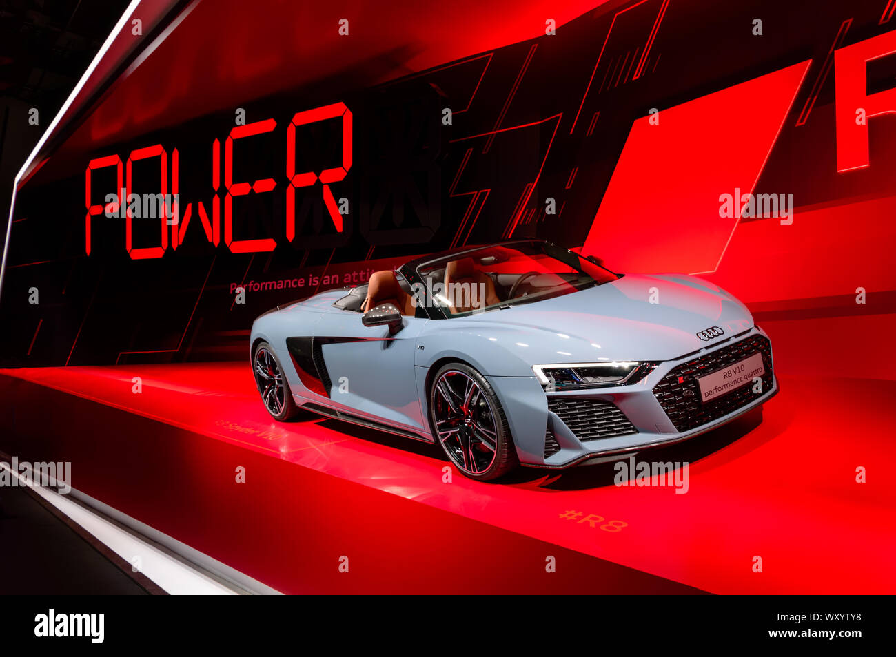 New gray Audi R8 V10 performance quattro cabriolet car presented at IAA  2019 against red background Stock Photo - Alamy