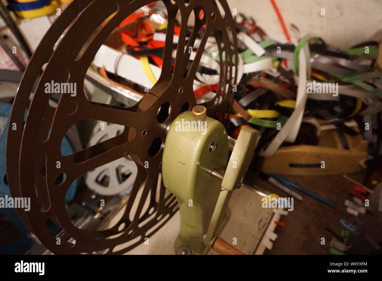 Basement studio of underground, experimental filmmaker Craig Baldwin. Mission District, San Francisco, California.  Moviscop viewer on editing table. Stock Photo