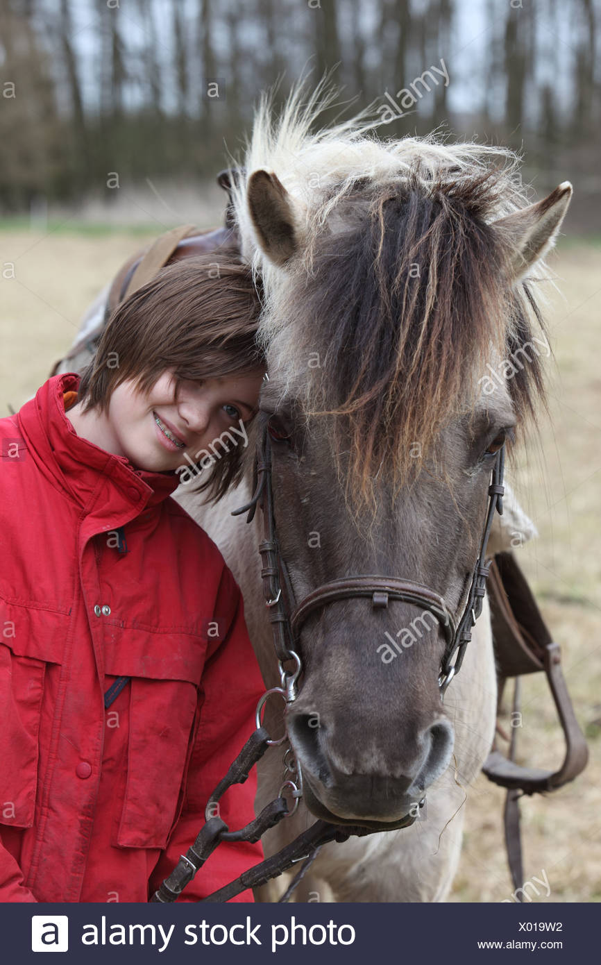 New Katwin Germany Girls Making Out With Her Pony Stock Photo