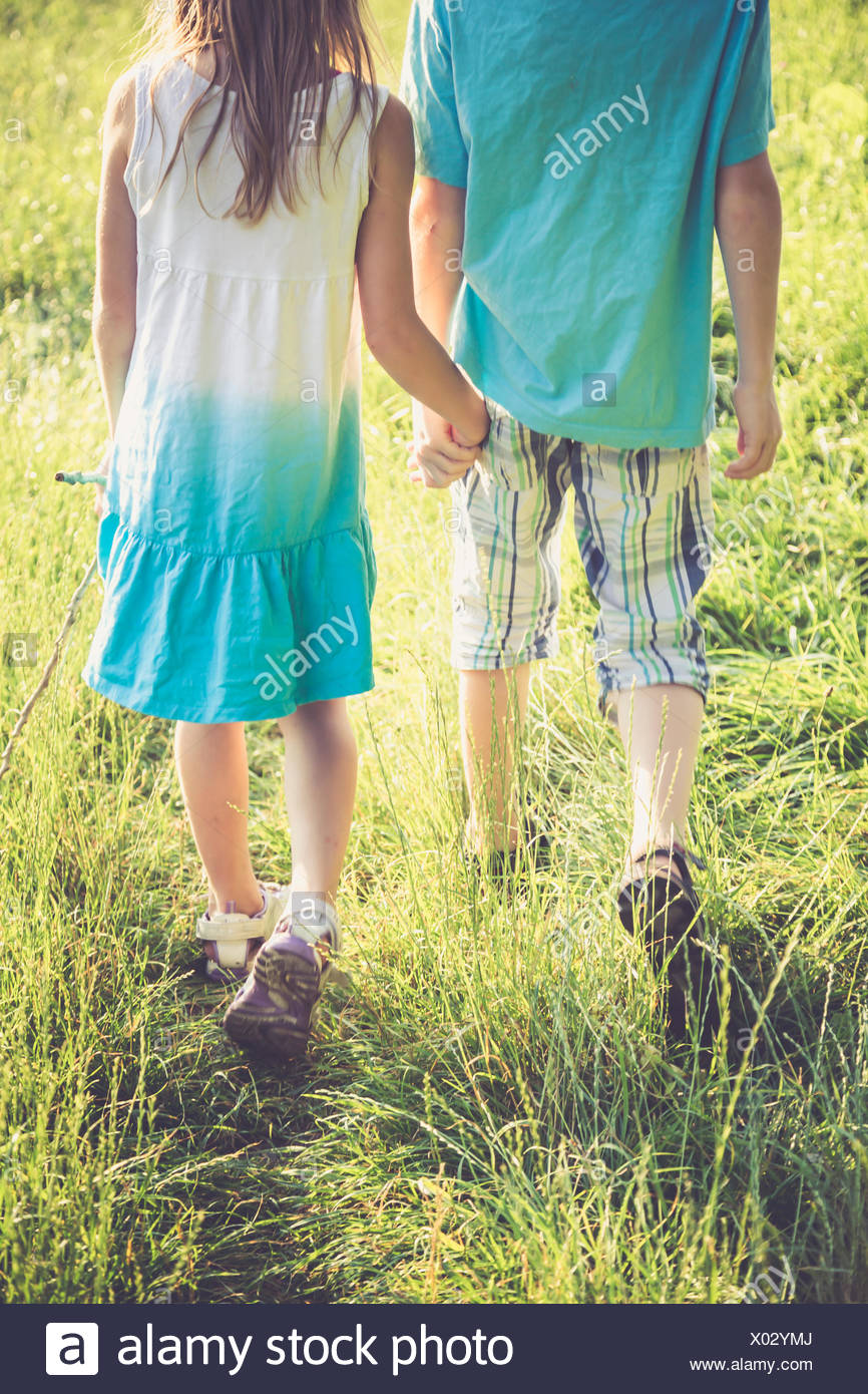 Sister Brother Holding Hand High Resolution Stock Photography and ...
