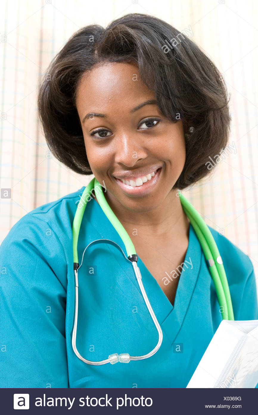 Nurse portrait, smiling black nurse wearing scrubs and a stethoscope