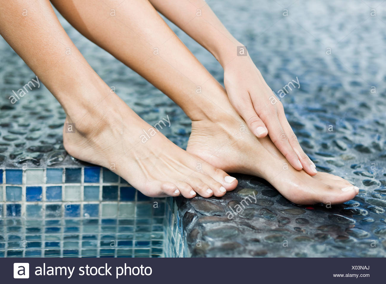 Rubbing Foot High Resolution Stock Photography and Images Alamy