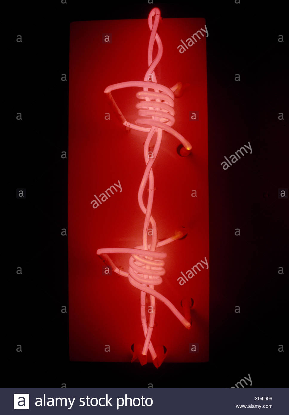 Close-up of red sixties barbed wire neon lighting