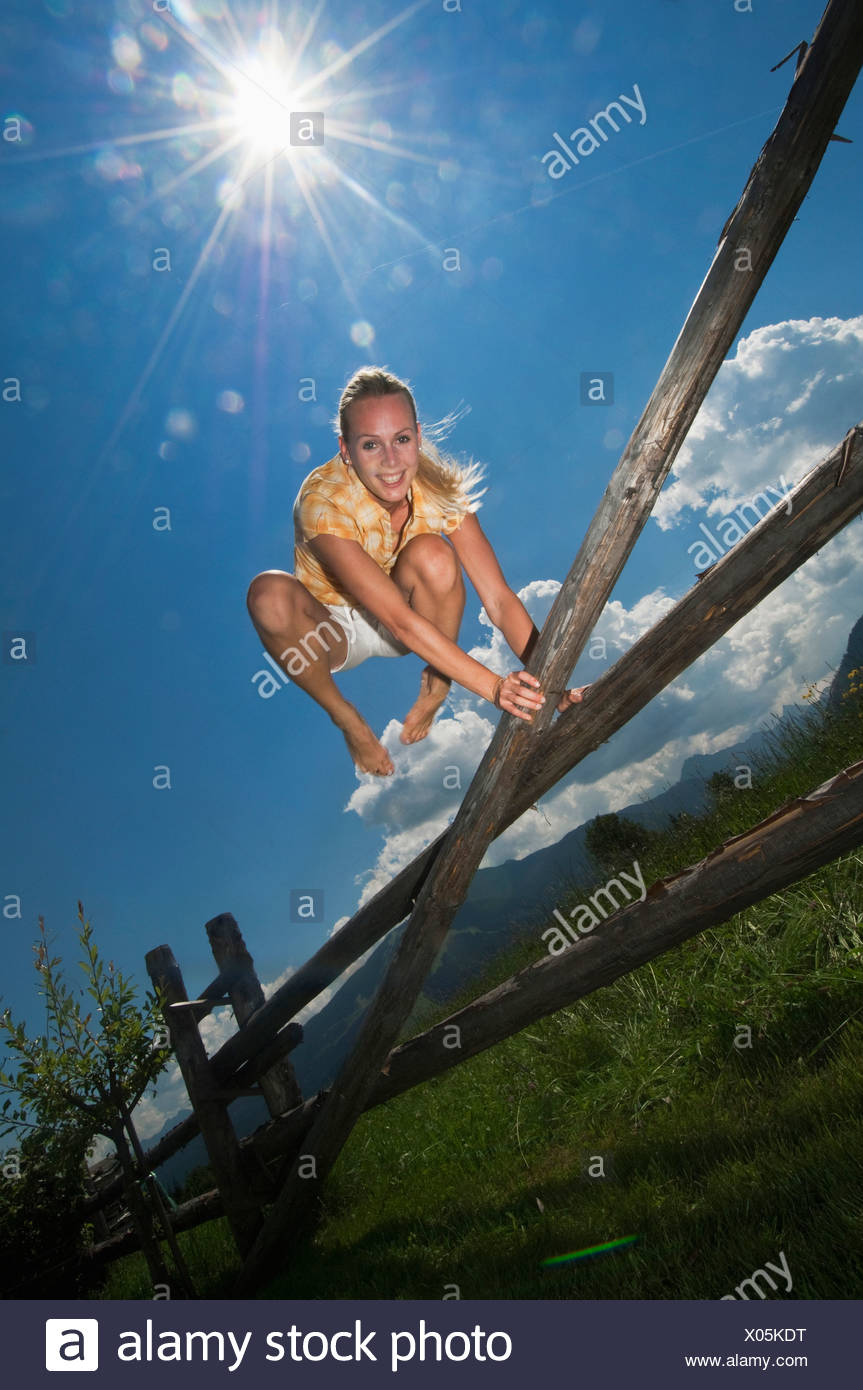 Woman Jumping Over Fence High Resolution Stock Photography And Images Alamy Woman Jumping Over Fence High Resolution Stock Photography And Images Alamy