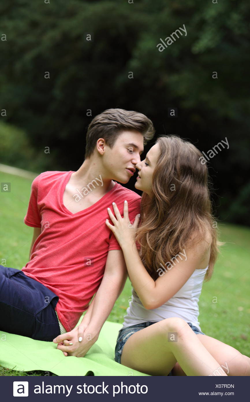 Romantic Young Teenage Couple Kissing Stock Photo Alamy