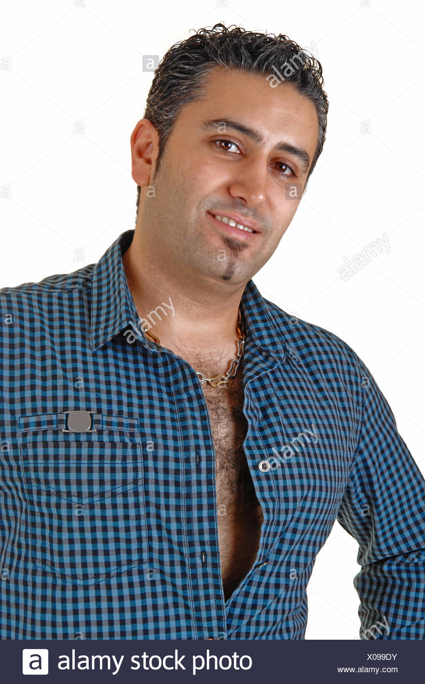A Handsome Black Haired Man In A Dark Blue Shirt Standing Smiling