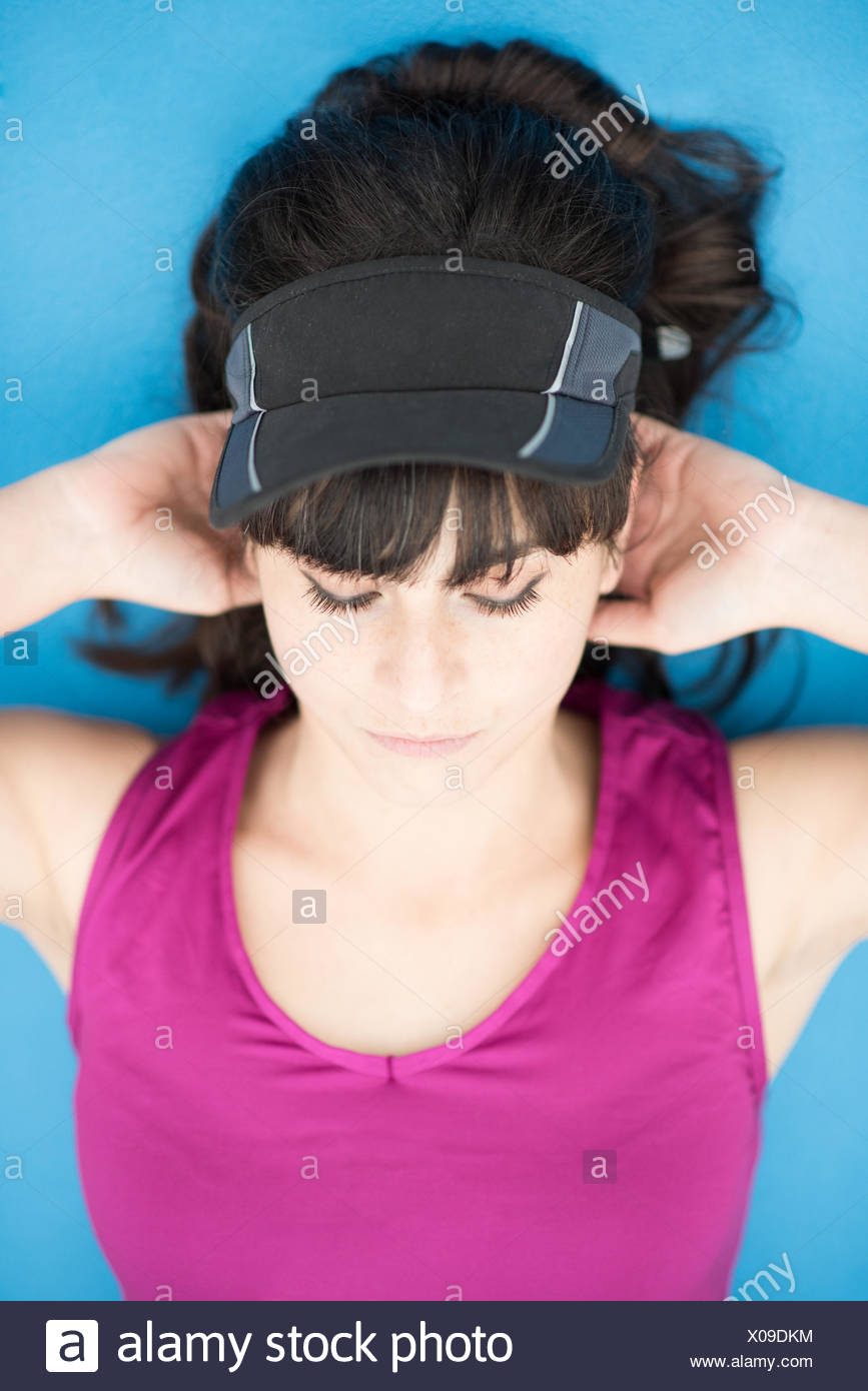 Woman Lying Down With Head High Resolution Stock Photography and Images