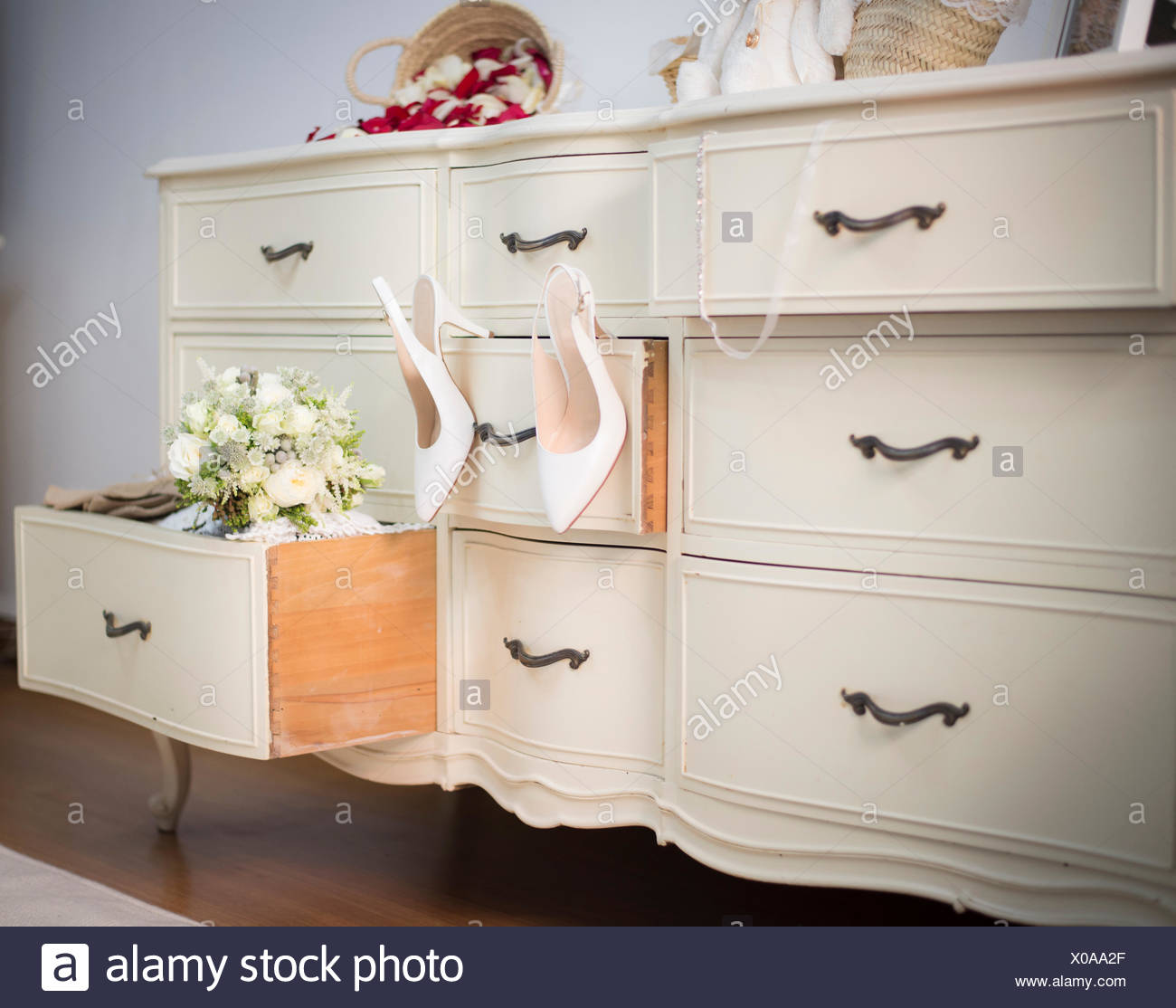 Wedding Shoes And Bouquet On A Dresser Stock Photo 275593319 Alamy