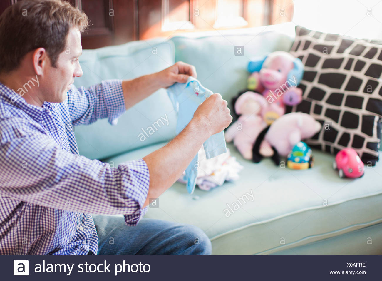 folding baby clothes