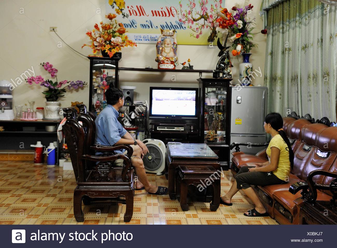 People Watching Tv In The Lobby Of An Hotel Yen Minh Ha - 