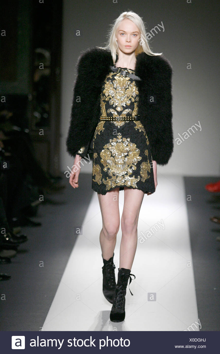 Balmain Paris Ready to Wear Autumn Winter Black short dress gold  embroidery, black fur jacket and black laced up ankle boots Stock Photo -  Alamy