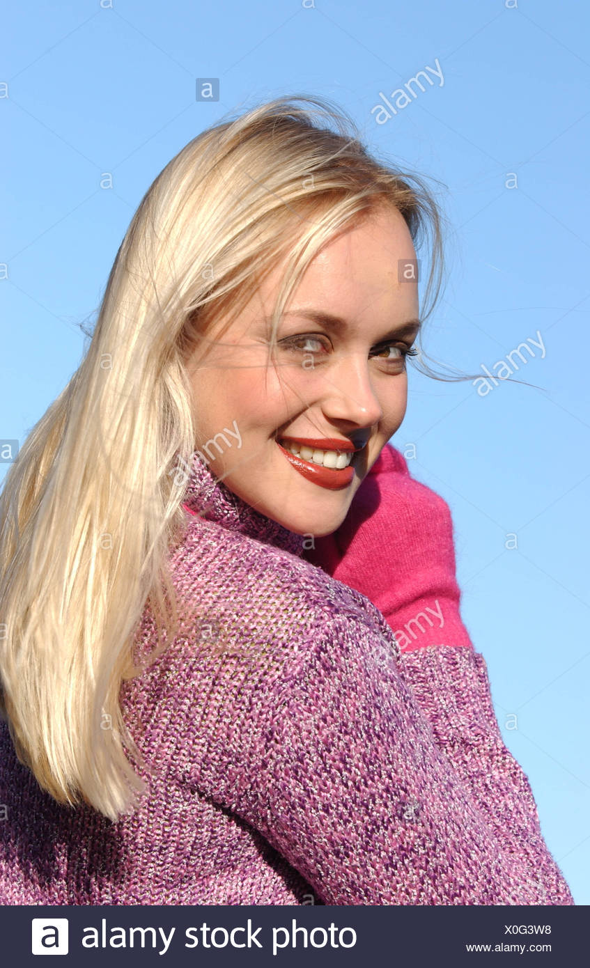 Female Long Blonde Hair Brown Tones Of Make Up Wearing Purple