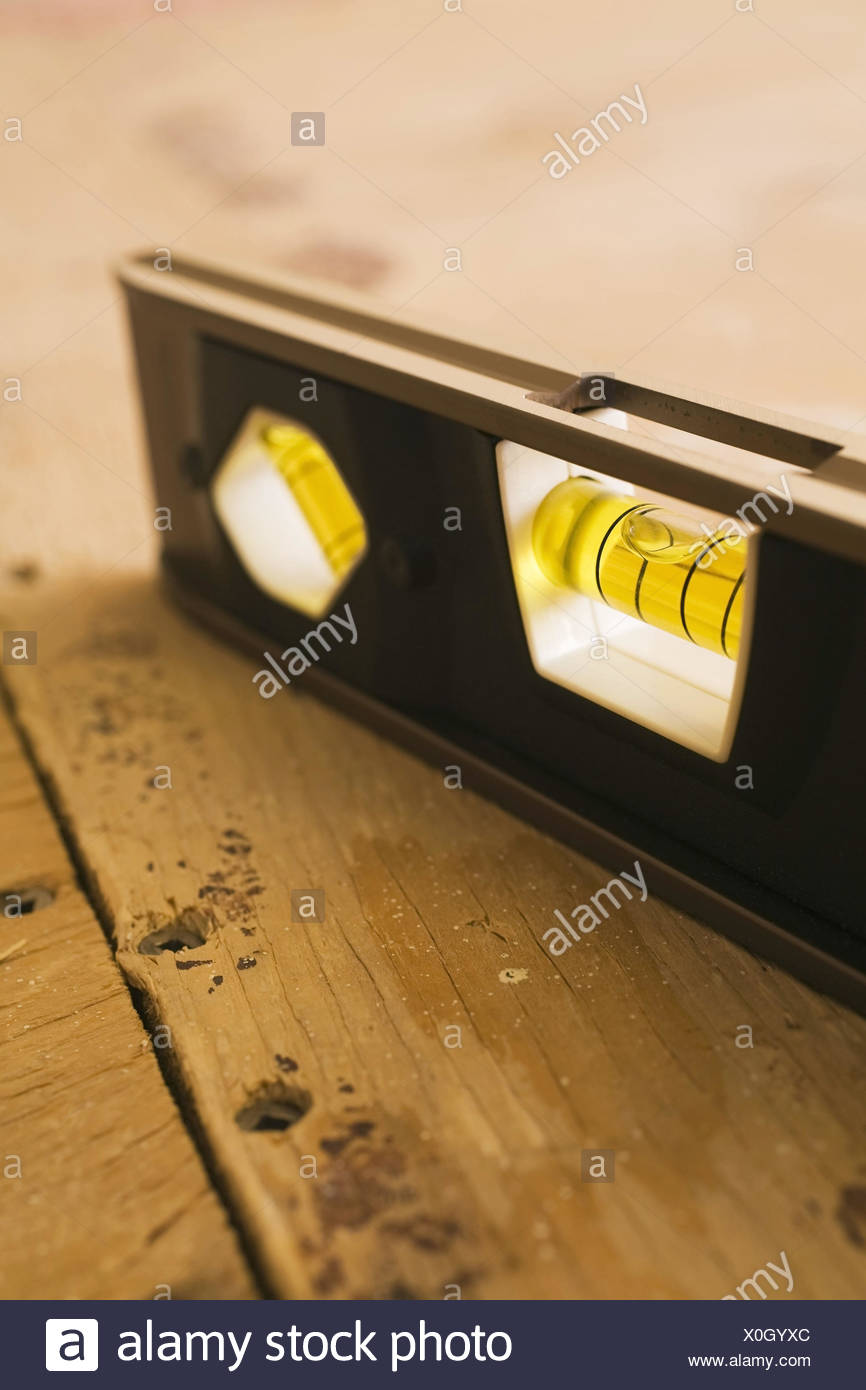 Close Up Of A Spirit Level On A Plywood Floor Studio Composition