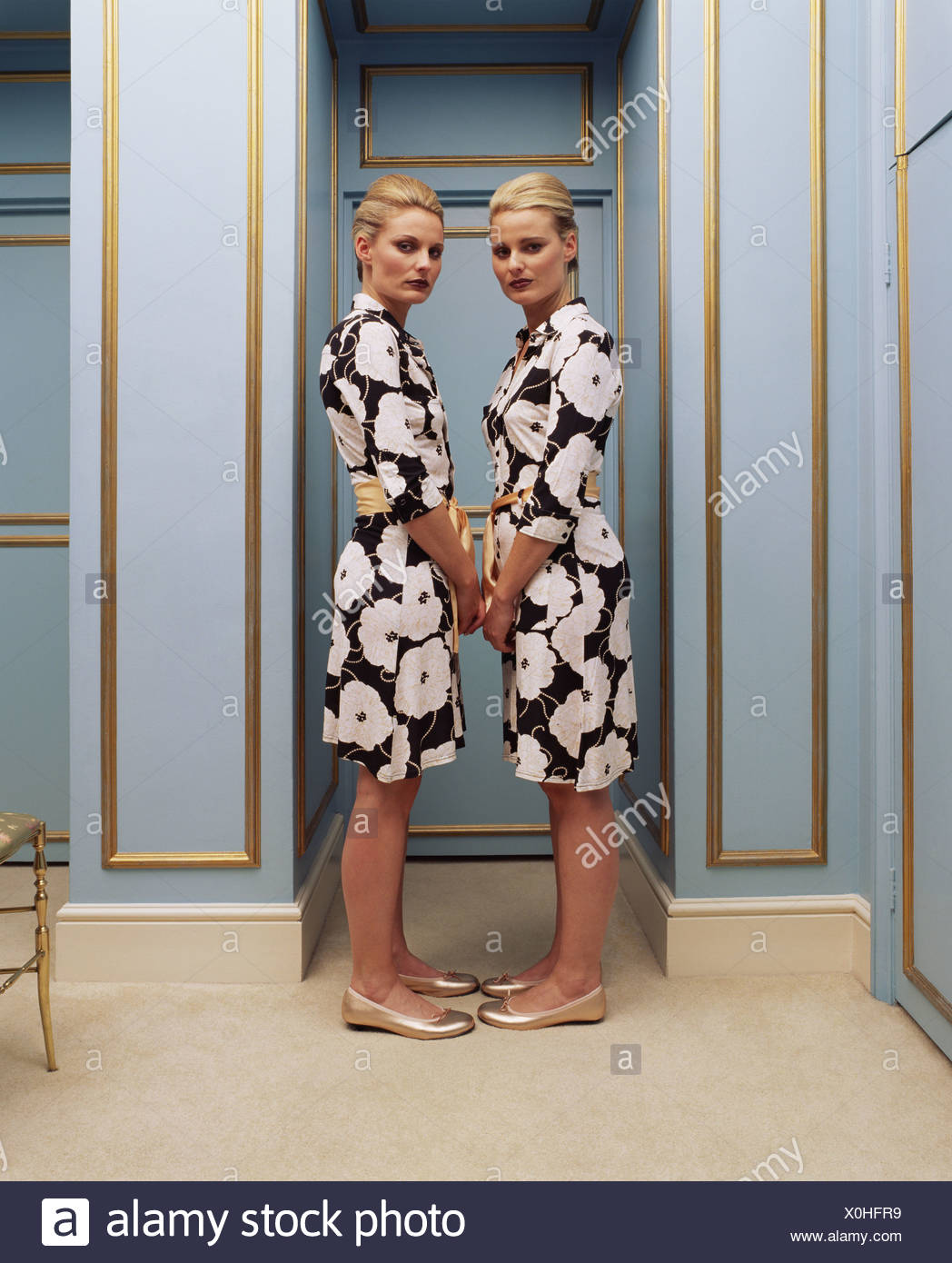 Two Women Wearing The Same Dress Stock Photo Alamy