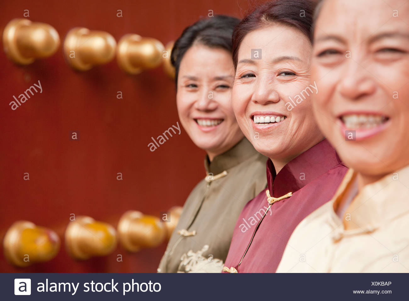 Group Of Mature Women In Traditional Clothes Standing Next