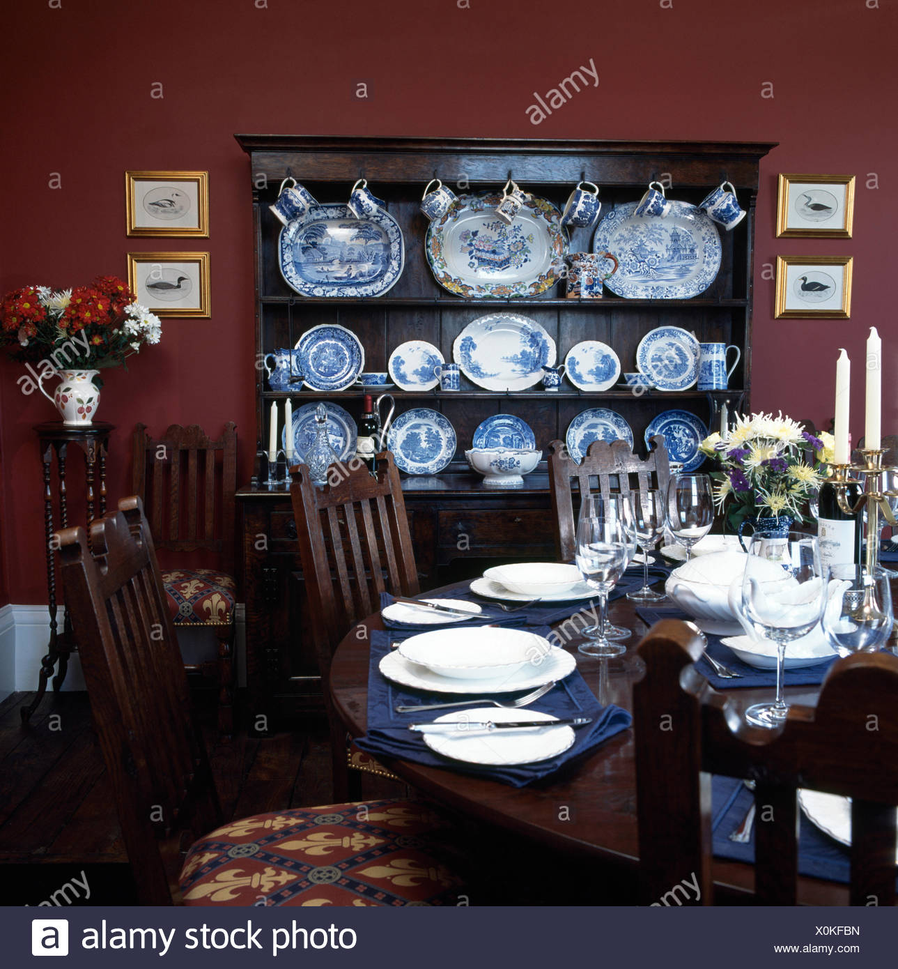 Table Set For Dinner In Dark Red Nineties Dining Room With A