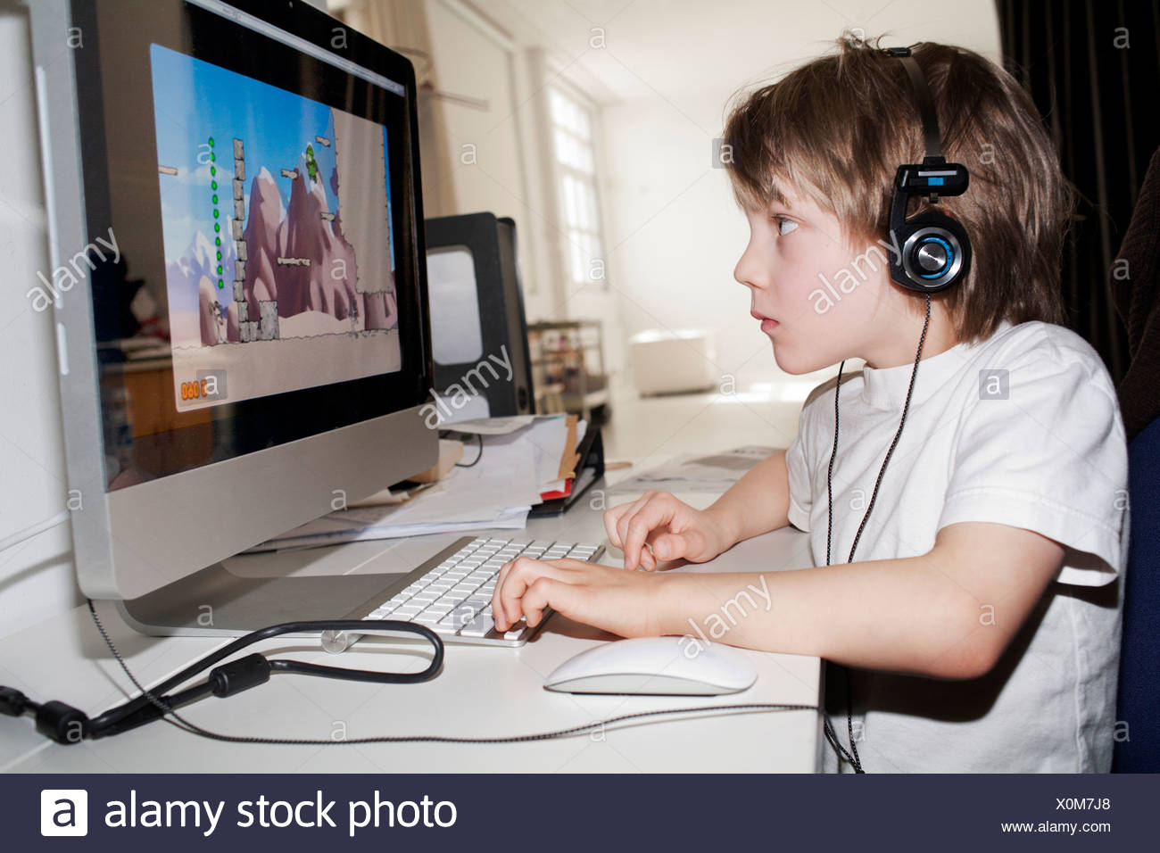 boy playing computer games