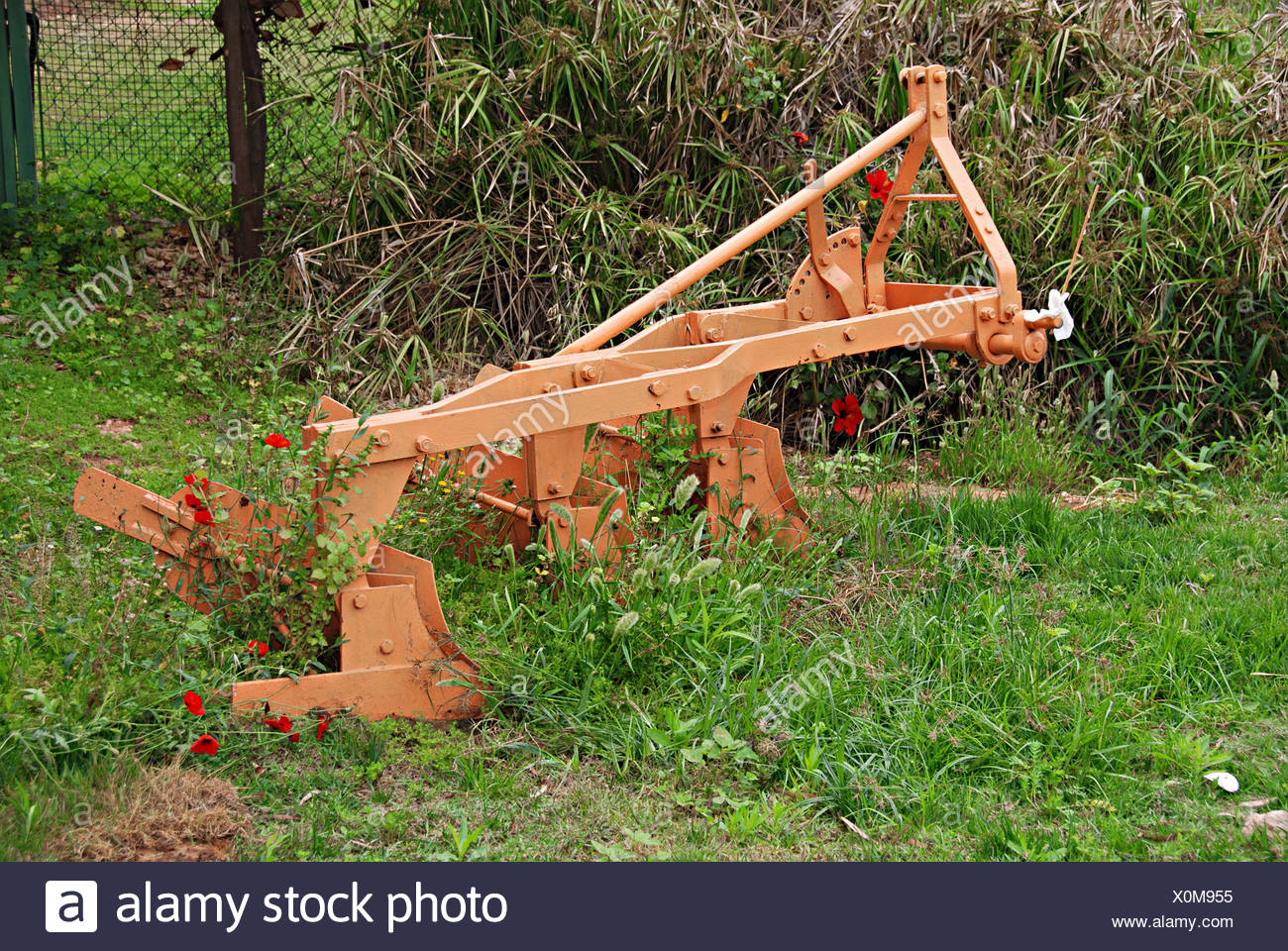 Old Manual iron plough single blade - Stock Image