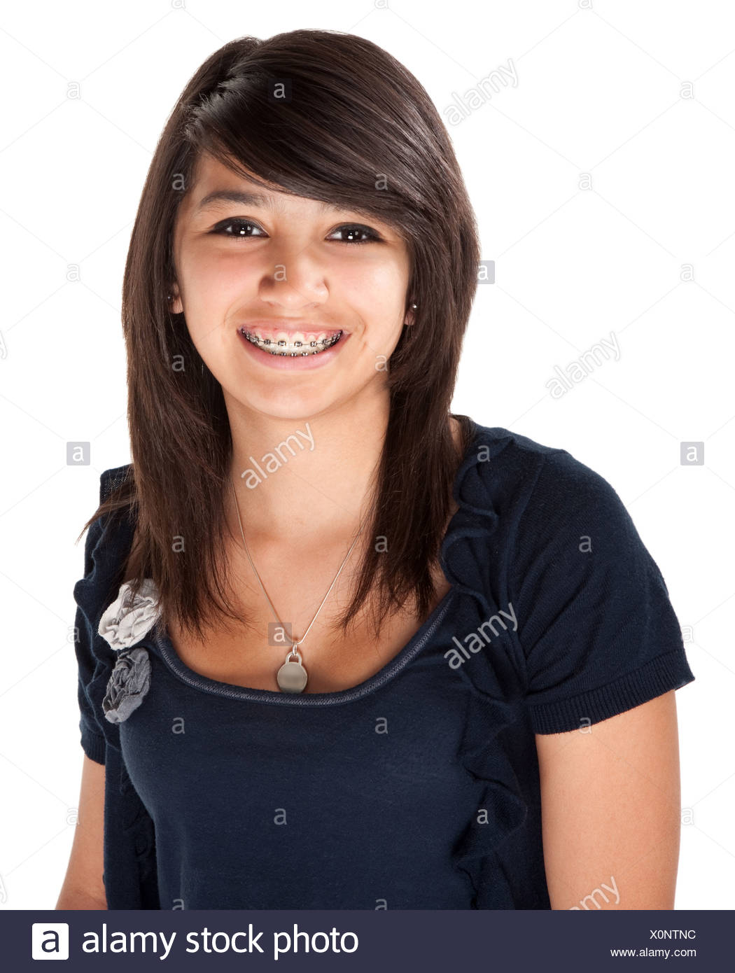 Cute Hispanic Teenage Girl With Braces And A Big Smile