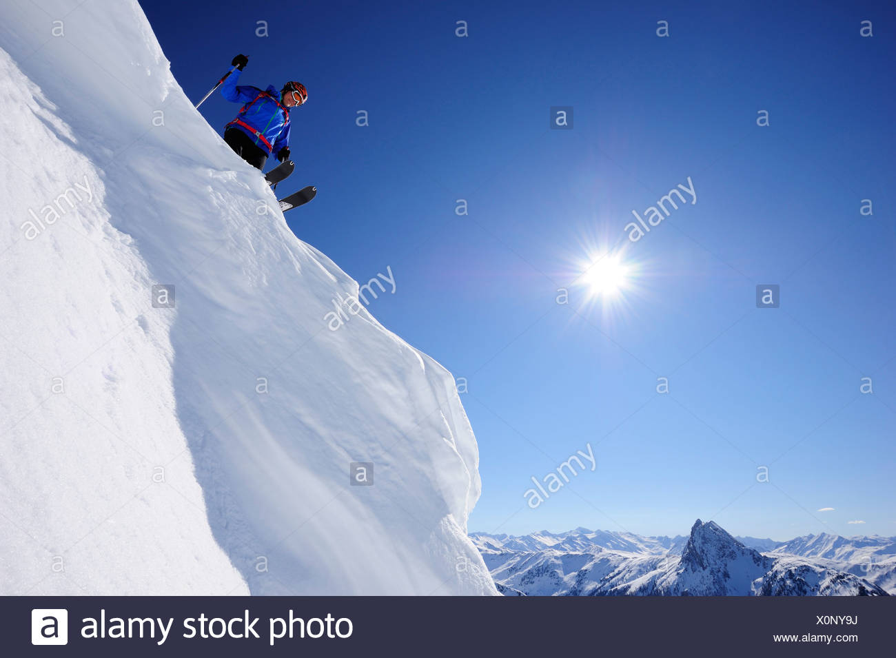 Skier On Snow Cornice Preparing For Downhill Skiing Grosser