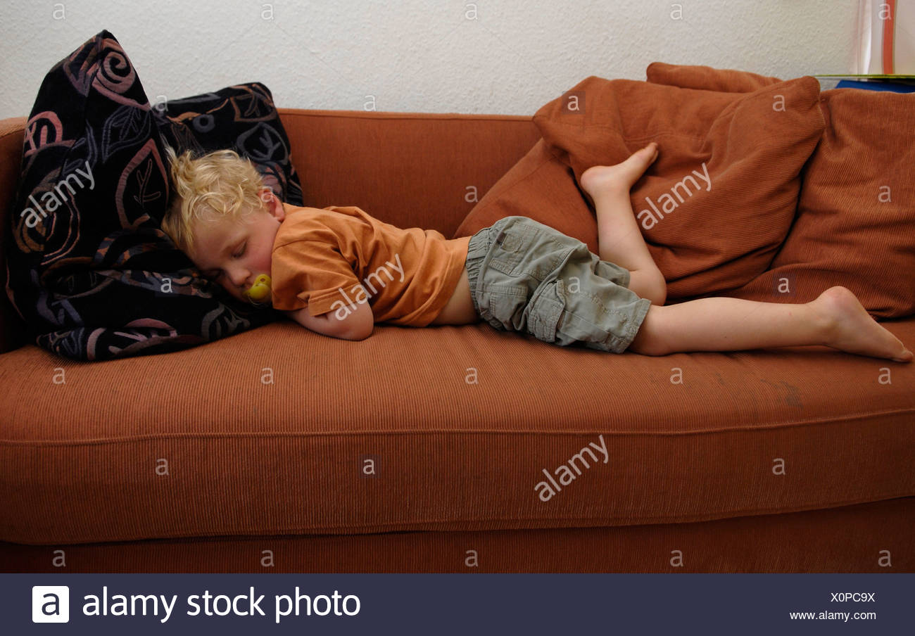 Little Boy Sleeps On Sofa Stock Photo 275858518 Alamy