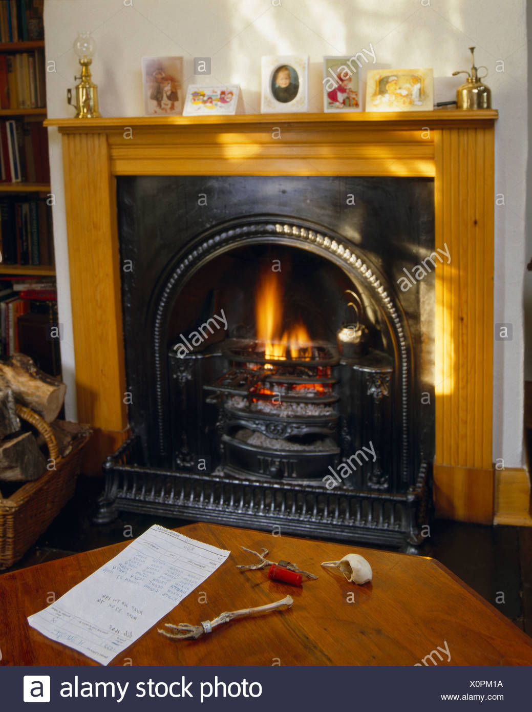 Found Objects On Table In Front Of Fireplace With Wooden