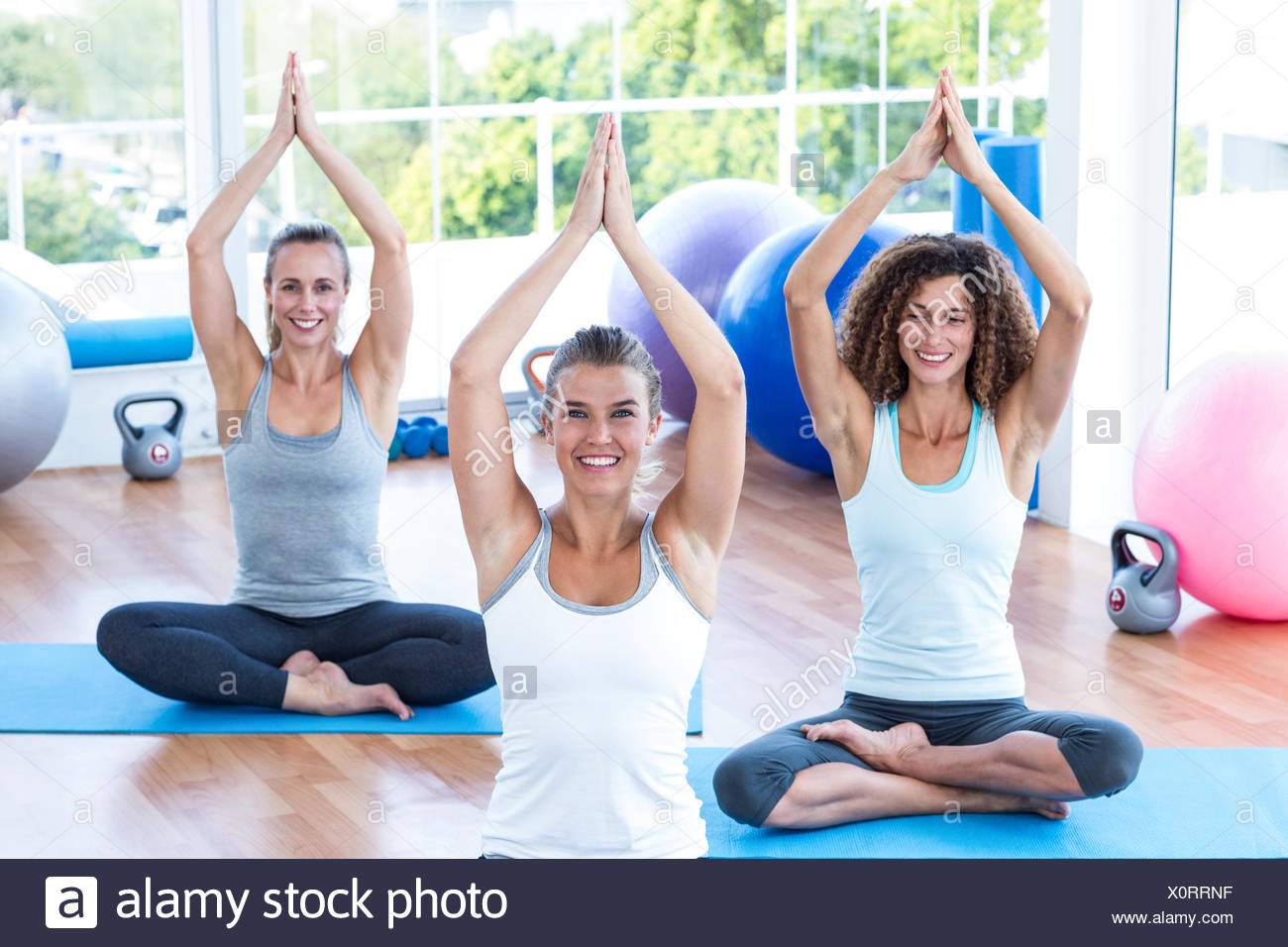 Lotus Pose With Hands Over Head Lotus Pose With Hands Over Head