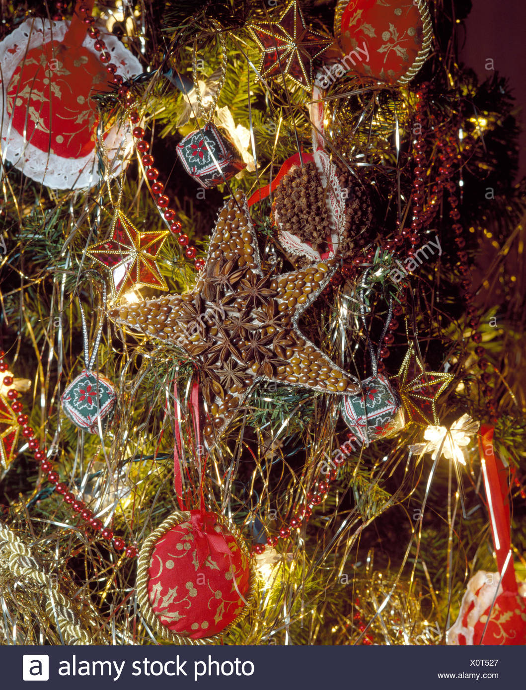 Close up of home made Christmas tree decorations with gold lametta Stock Image