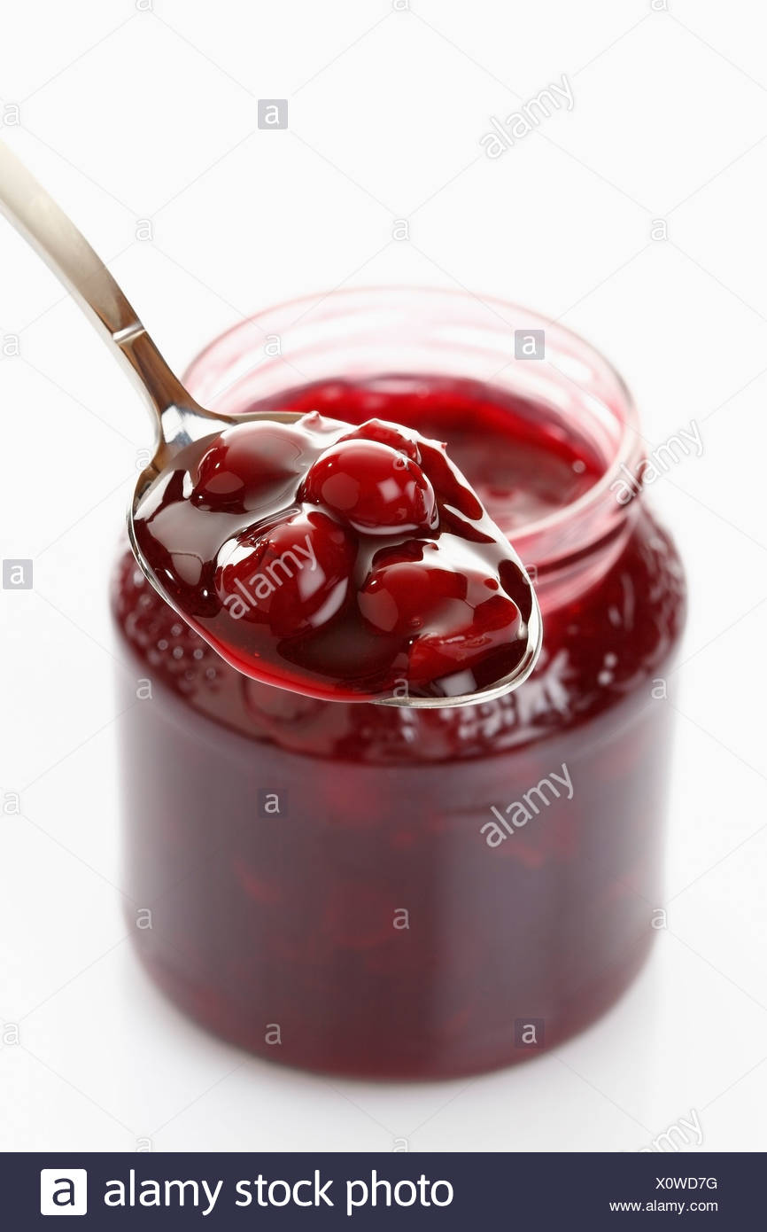 Download Red Fruit Jelly In Glass Jar And Spoon On White Background Stock Photo Alamy Yellowimages Mockups