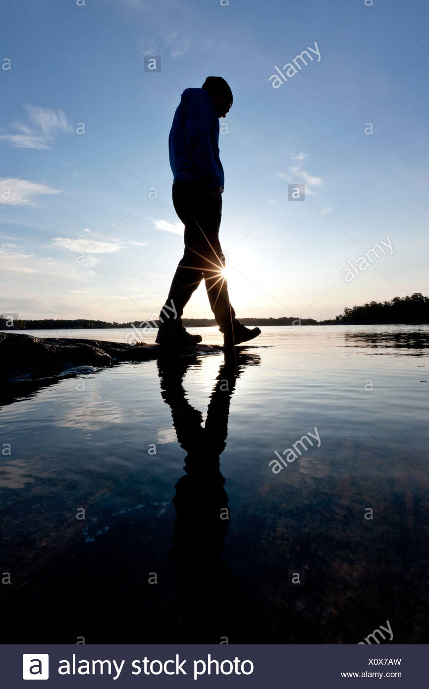 Man Walking Silhouette Away High Resolution Stock Photography and