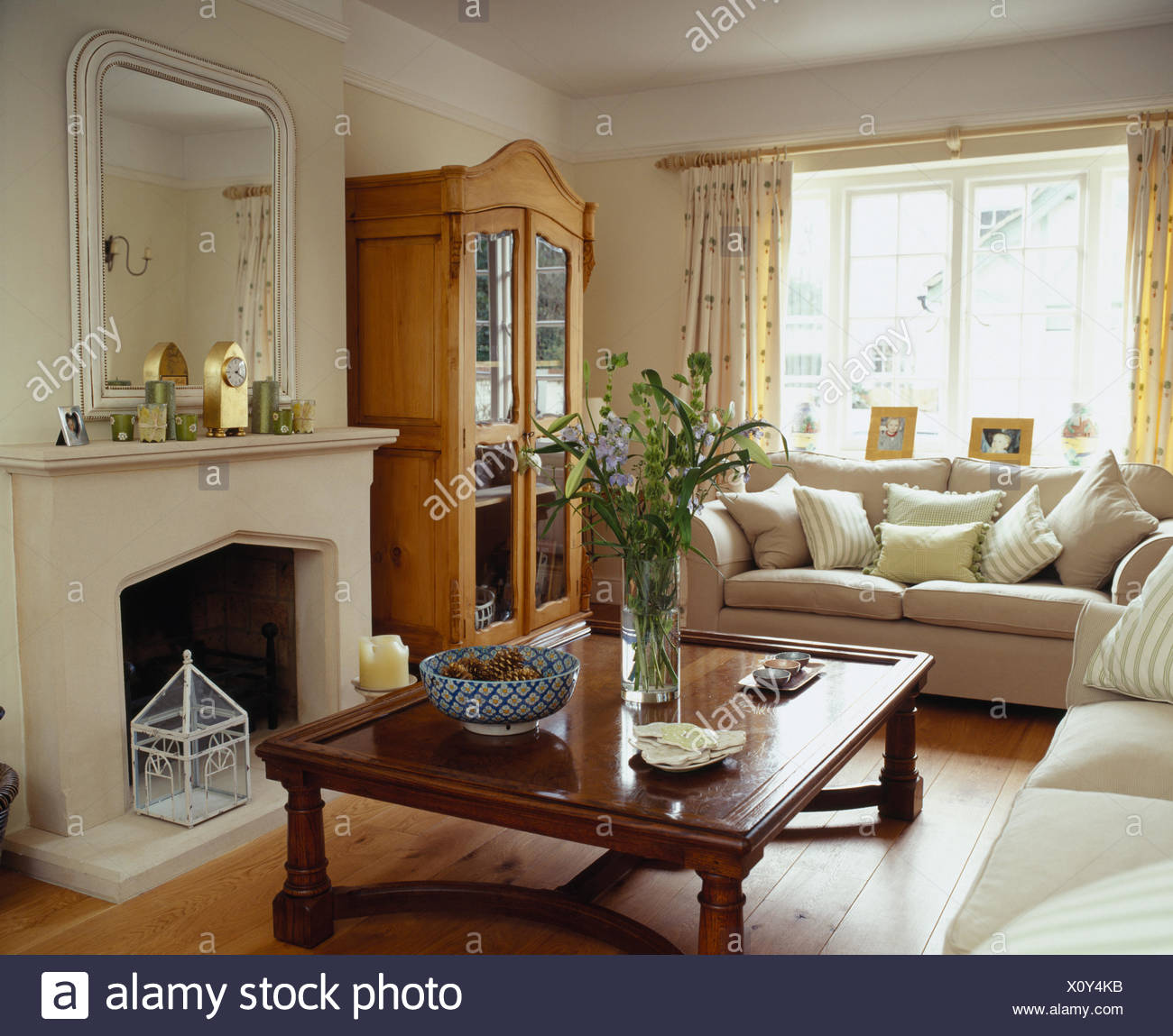 Indonesian Wood Coffee Table In Front Of Fireplace In Living Room