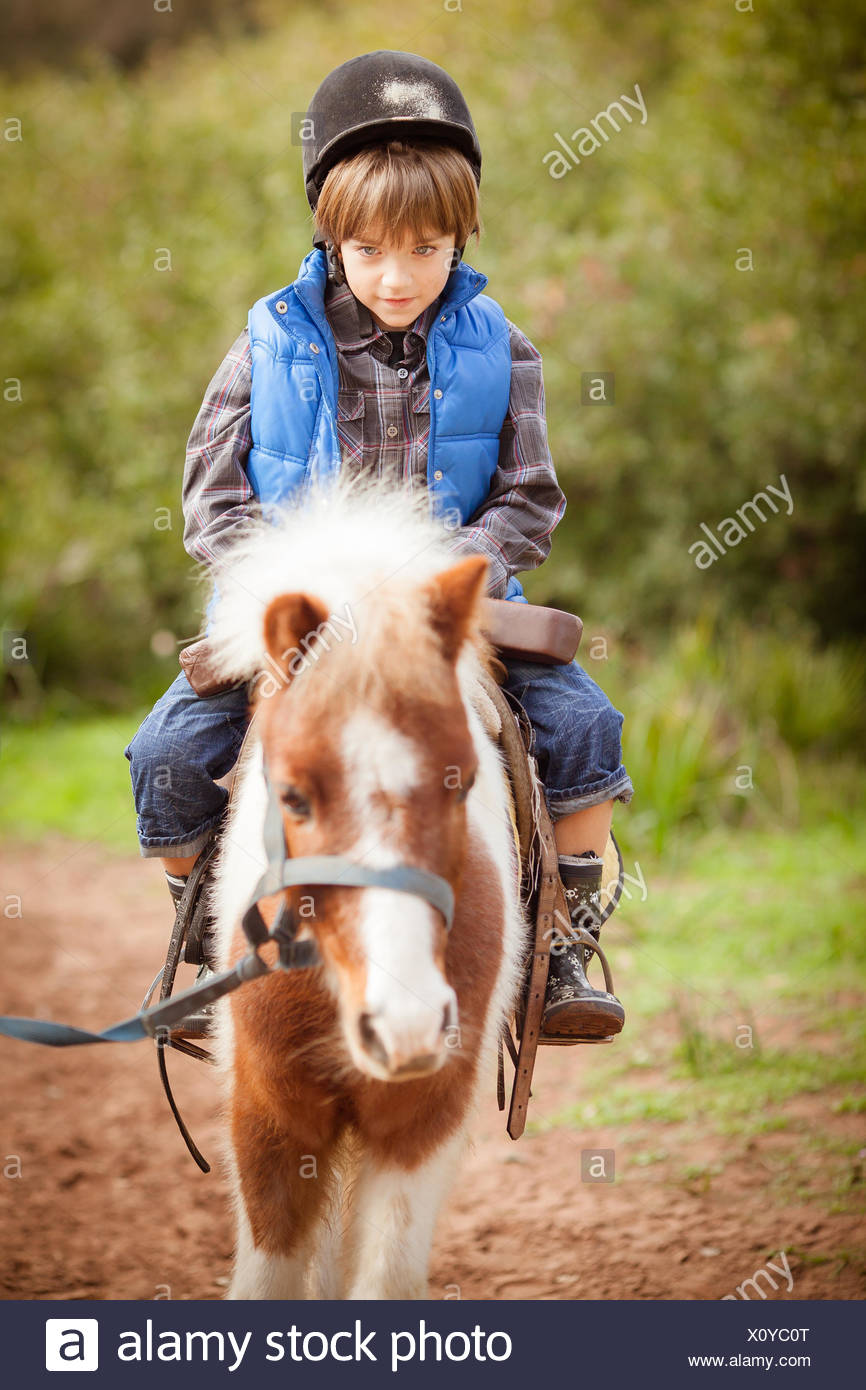 Download Boy Riding A Pony Morocco Stock Photo Alamy