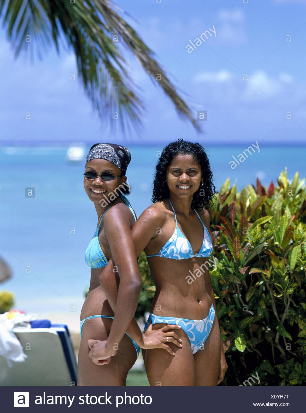 Mauritius, west coast, beach, locals, bikinis, smile, no model release,  Indian ocean, Maskarenen, island state, island, women, Kreolen,  dark-skinned, friendship, swimwear, smile, body, wet, course, naturalness  Stock Photo - Alamy