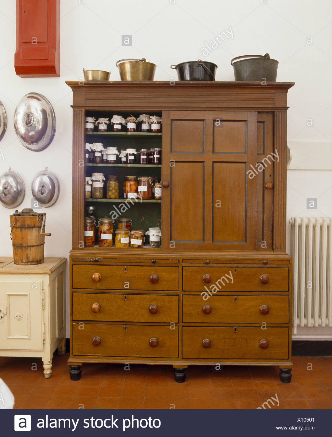 Preserves And Jams Stored In Antique Kitchen Dresser Stock Photo