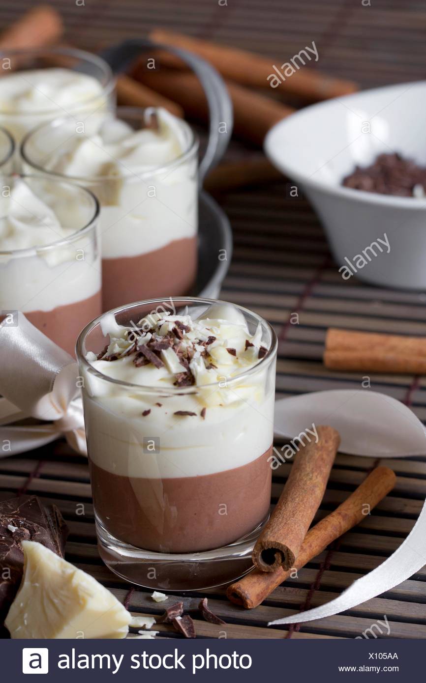 Mousse Au Chocolat In Glasses And Cinnamon Sticks Stock Photo Alamy