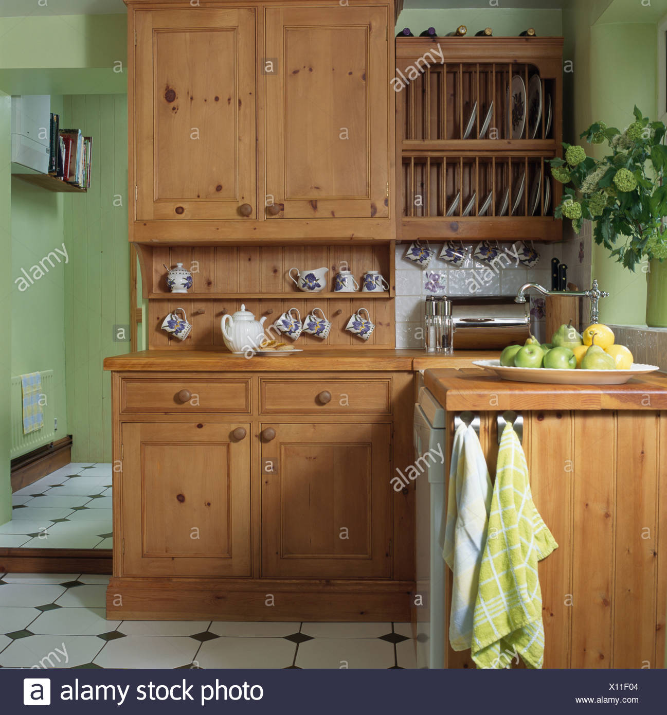 Teat Towels On The Side Of Fitted Unit In Pale Green Cottage