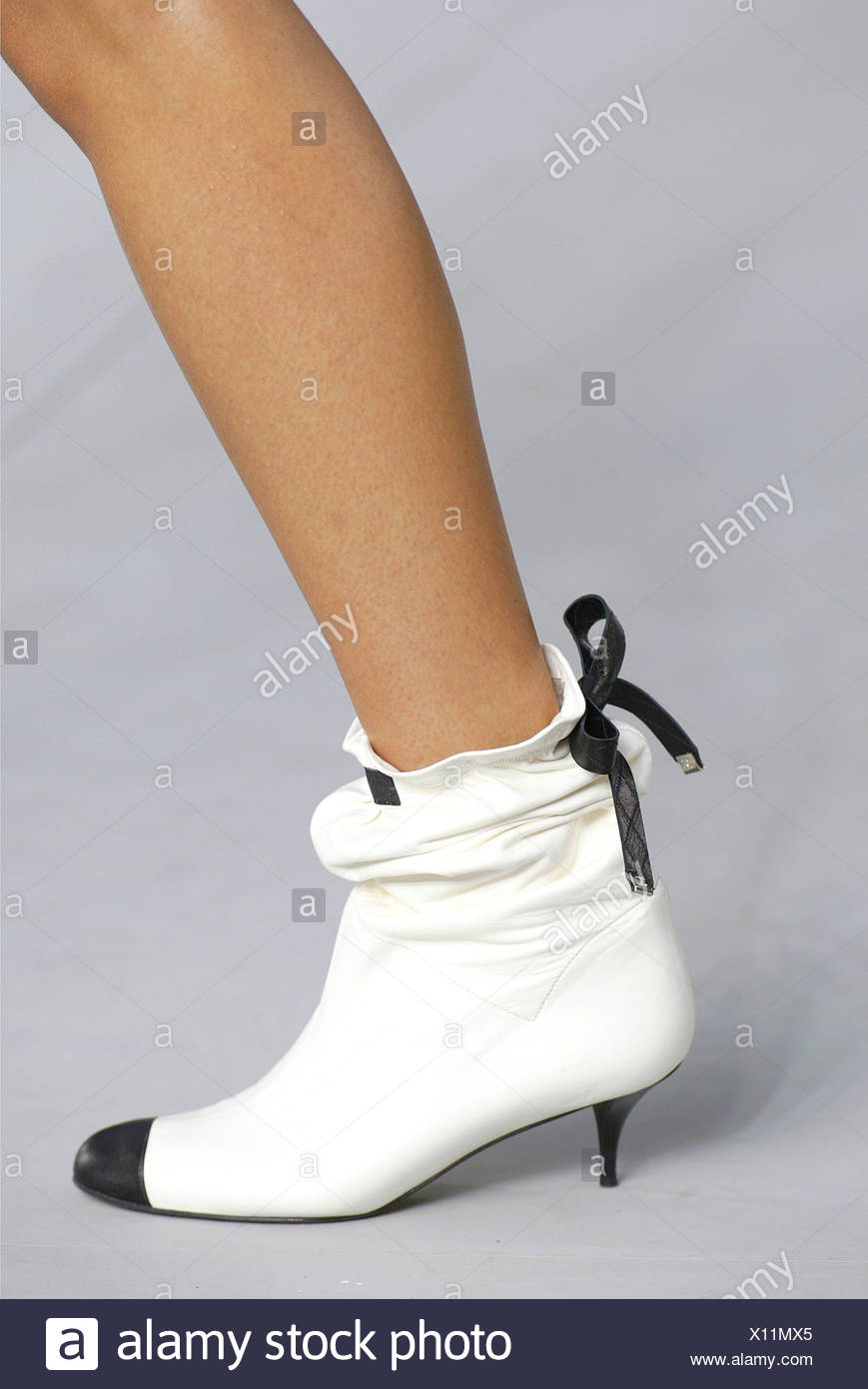 chanel white boots black toe