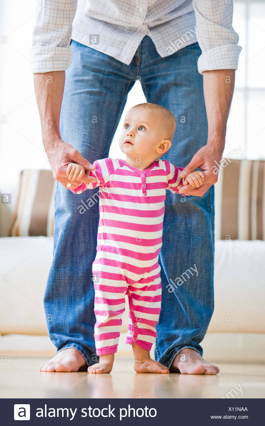 baby taking first steps