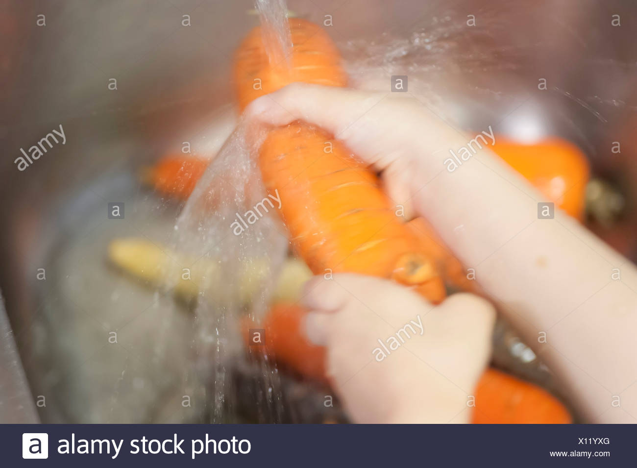 Cleaning Carrots High Resolution Stock Photography and Images Alamy