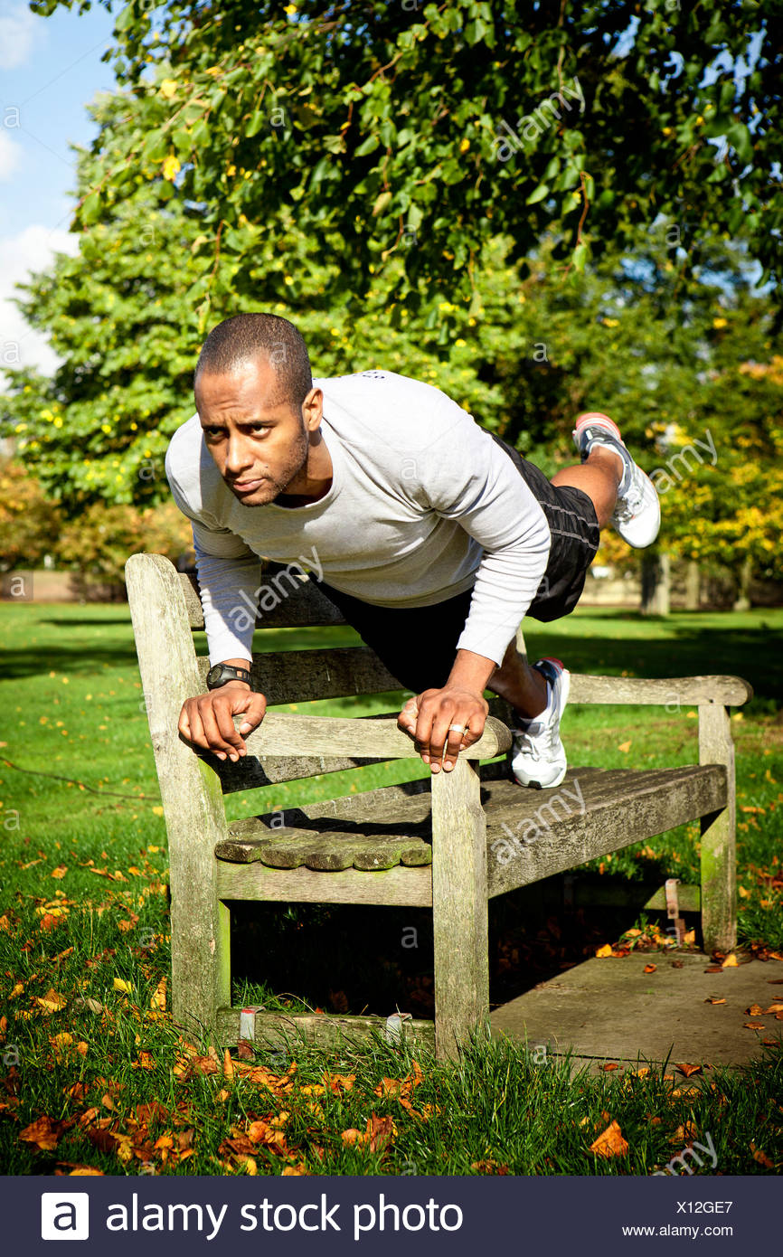 Man In Plank Position On Park Bench Stock Photo 276037391 Alamy