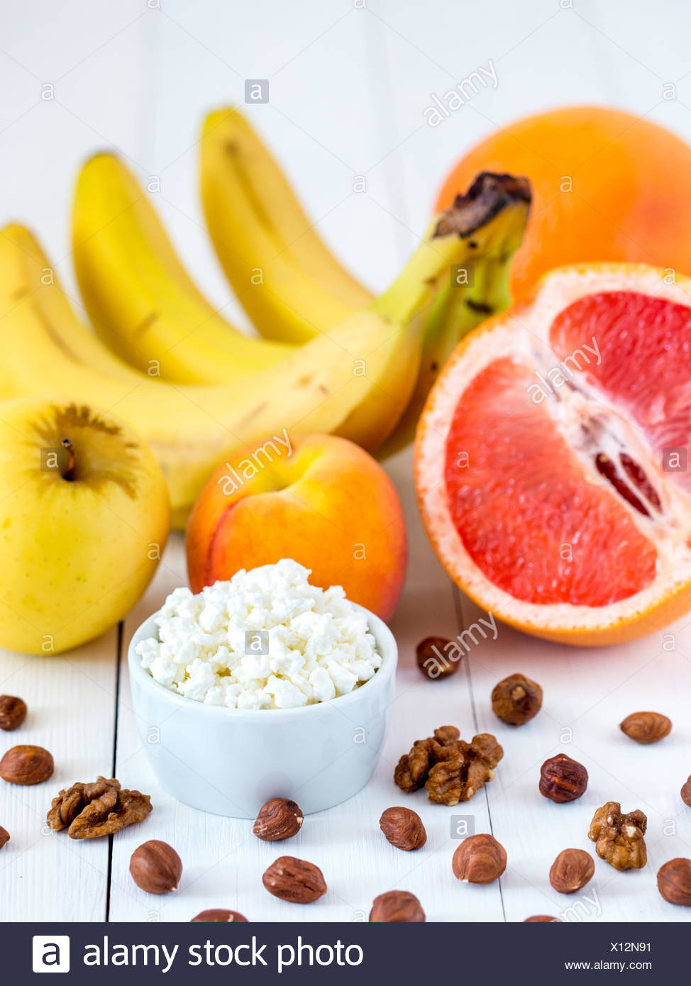 Dieting Cottage Cheese With Fresh Fruits And Nuts Stock Photo