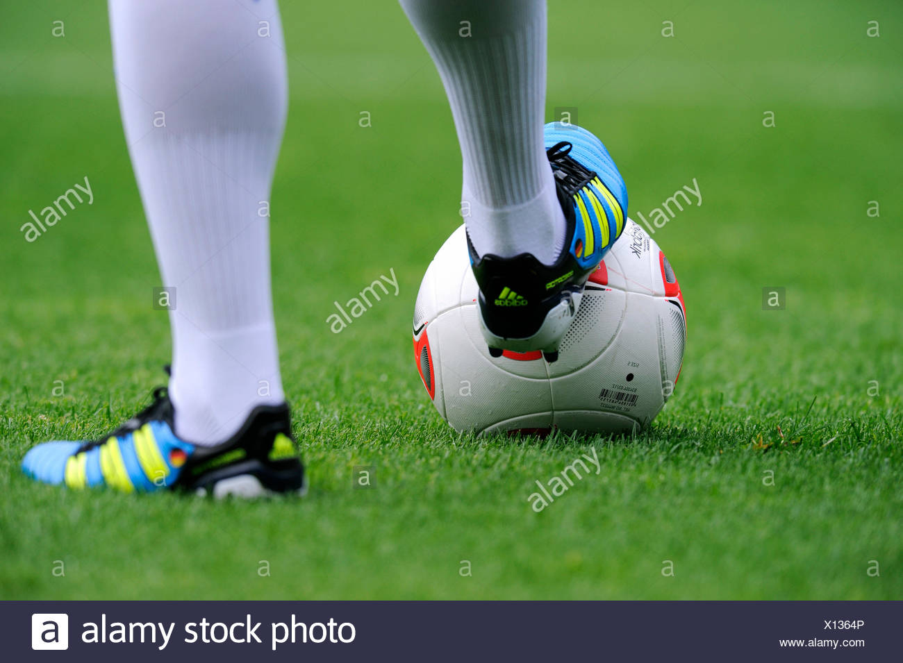 Players legs wearing adidas football boots and the adidas Torfabrik  anniversary ball for the 50th Bundesliga season, VfL Bochum Stock Photo -  Alamy