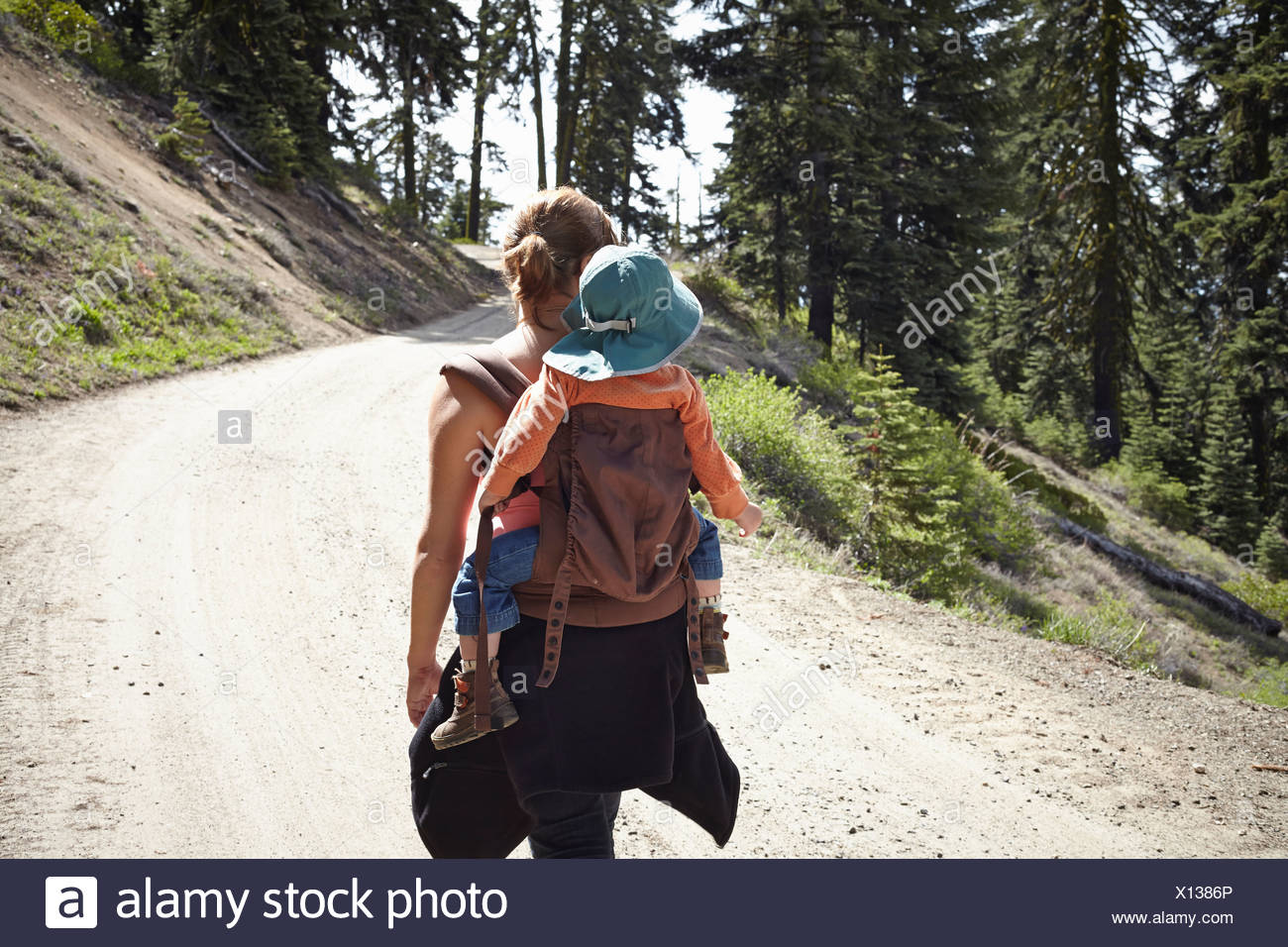 Woman Carrying Baby On Her Back High Resolution Stock Photography and