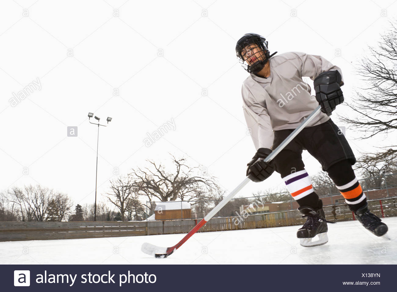 Ice Hockey Puck Moving Stock Photos & Ice Hockey Puck Moving Stock