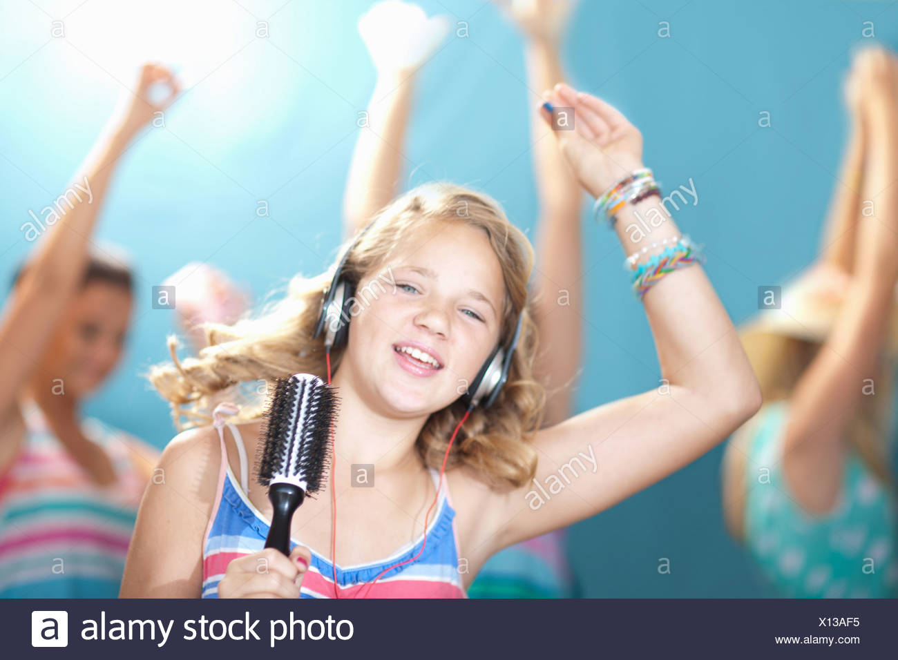 Girl Singing Into Hairbrush High Resolution Stock Photography and ...