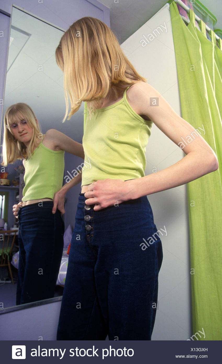 Girl Looking At Self In The Mirror High Resolution Stock Photography ...