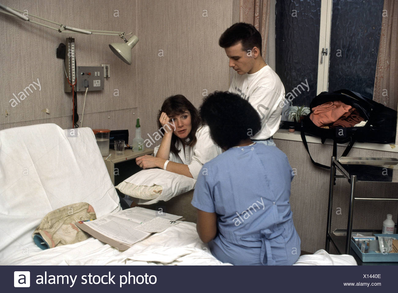 Midwife And Partner Assisting A Woman In Labour Labor In