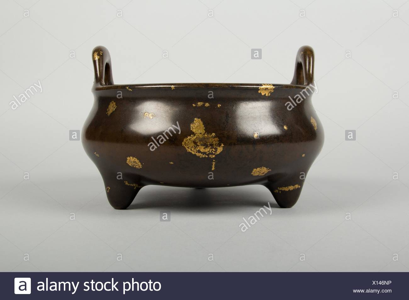 Period: Ming dynasty (1368-1644), Xuande period (1426-35); Culture: China; Medium: Bronze, inlaid gold, wood; Dimensions: H. 6 1/4